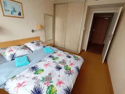 Łóżko lub łóżka w pokoju w obiekcie 10Q - Z6 Apartament 902