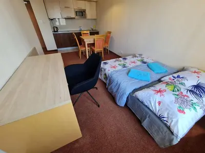 Łóżko lub łóżka w pokoju w obiekcie 10Q - Z6 Apartament 902