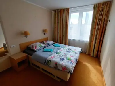 Łóżko lub łóżka w pokoju w obiekcie 10Q - Z6 Apartament 903