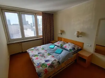 Łóżko lub łóżka w pokoju w obiekcie 10Q - Z6 Apartament 1001