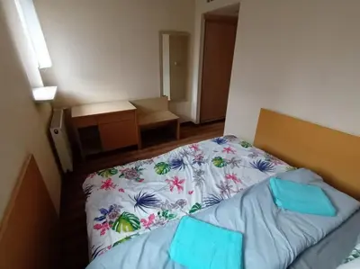 Łóżko lub łóżka w pokoju w obiekcie 10Q - Z6 Apartament 1004