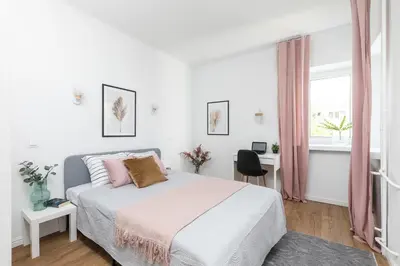 Łóżko lub łóżka w pokoju w obiekcie SuperApart Nowolipki 23, Unwind in Urban Chic Apartament