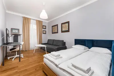 Łóżko lub łóżka w pokoju w obiekcie Apartament Mariensztat by Your Freedom