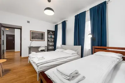 Łóżko lub łóżka w pokoju w obiekcie Apartament Mariensztat by Your Freedom