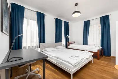 Łóżko lub łóżka w pokoju w obiekcie Apartament Mariensztat by Your Freedom