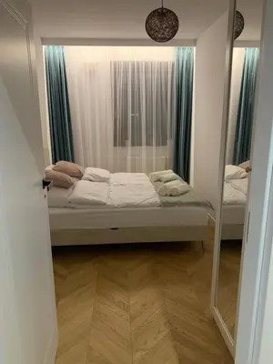 Łóżko lub łóżka w pokoju w obiekcie Forest Apart I