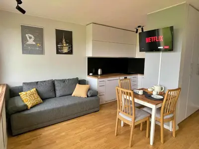 Telewizja i/lub zestaw kina domowego w obiekcie Szucha 27 - Royal Łazienki Flat