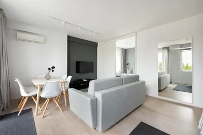 Część wypoczynkowa w obiekcie New Praga Urban Modern Apartment by BookingHost