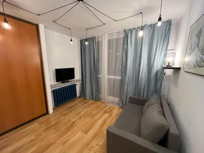 Telewizja i/lub zestaw kina domowego w obiekcie Murano Apartaments Atrium