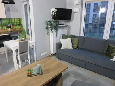 Część wypoczynkowa w obiekcie Nowoczesny apartament z garażem i balkonem Mokotów