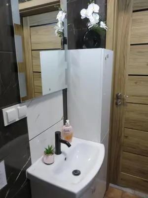 Łazienka w obiekcie Nowoczesny apartament z garażem i balkonem Mokotów
