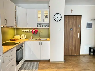 Kuchnia lub aneks kuchenny w obiekcie Różana Apartment with Parking