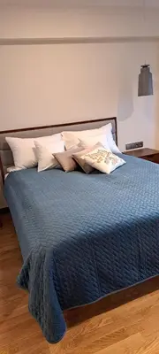 Łóżko lub łóżka w pokoju w obiekcie Falcon Apartment Center 2 Metro Złote Tarasy