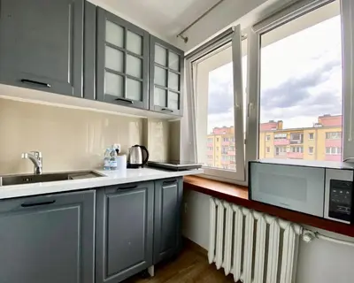 Kuchnia lub aneks kuchenny w obiekcie K22 Al Jana Pawła II Apartments 2