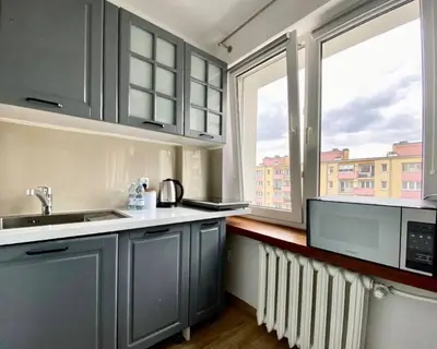 Kuchnia lub aneks kuchenny w obiekcie K22 Al Jana Pawła II Apartments 2