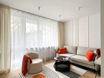 Część wypoczynkowa w obiekcie Gustowny apartament przy metrze