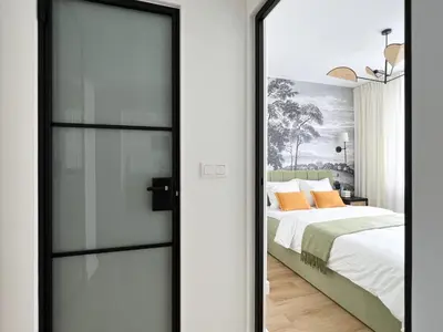 Łóżko lub łóżka w pokoju w obiekcie Gustowny apartament przy metrze