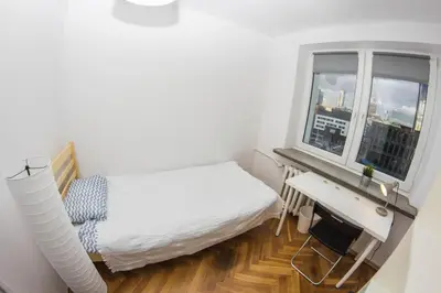 Łóżko lub łóżka w pokoju w obiekcie Regem Pokoje Platynowa