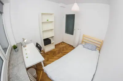 Łóżko lub łóżka w pokoju w obiekcie Regem Pokoje Platynowa