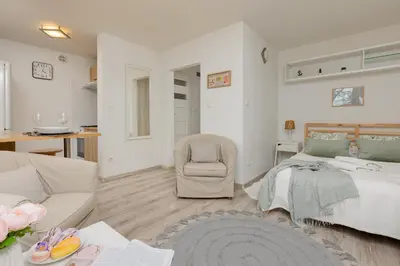 Łóżko lub łóżka w pokoju w obiekcie Light Studio with Balcony by Noclegi Renters