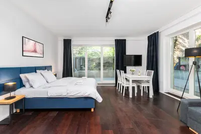 Łóżko lub łóżka w pokoju w obiekcie Apartamenty Piękna 28A by Your Freedom