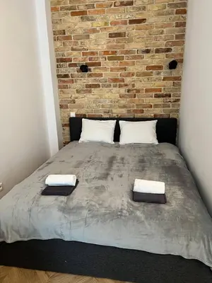 Łóżko lub łóżka w pokoju w obiekcie Luxury Apartment In The City Center , Wi-Fi - by HIK Apartments