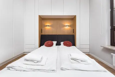 Łóżko lub łóżka w pokoju w obiekcie Skierniewicka 34 by Homeprime