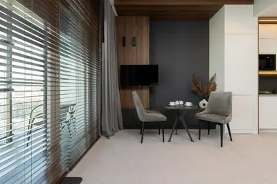 Część wypoczynkowa w obiekcie Cozy Apartments Warsaw Wola Kasprzaka by Noclegi Renters