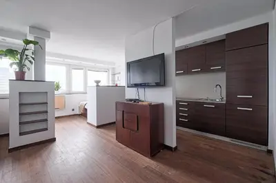 Telewizja i/lub zestaw kina domowego w obiekcie Cozy And Bright - City Center - Zgoda 13