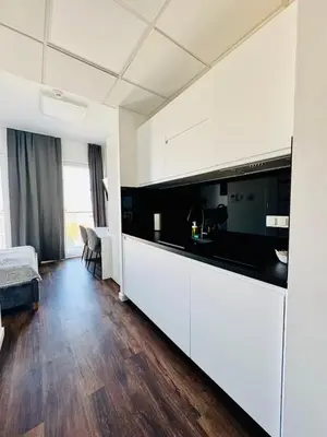 Łóżko lub łóżka w pokoju w obiekcie Vola Palace