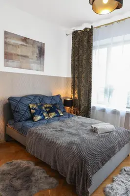 Łóżko lub łóżka w pokoju w obiekcie ClickTheFlat Three Crosses Square Apart Rooms