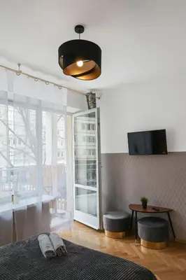 Telewizja i/lub zestaw kina domowego w obiekcie ClickTheFlat Three Crosses Square Apart Rooms