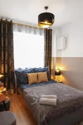 Łóżko lub łóżka w pokoju w obiekcie ClickTheFlat Three Crosses Square Apart Rooms