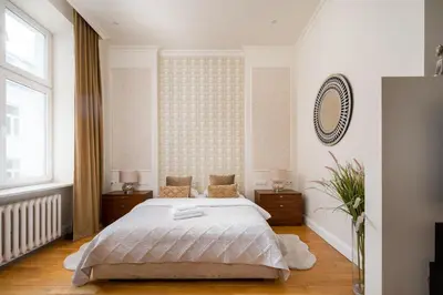Łóżko lub łóżka w pokoju w obiekcie Luxury Apartment 76 by BookingHost
