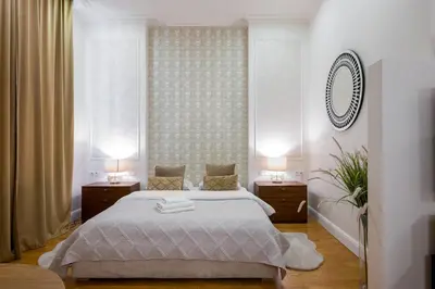 Łóżko lub łóżka w pokoju w obiekcie Luxury Apartment 76 by BookingHost