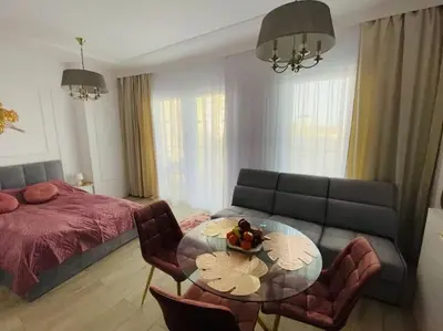 Łóżko lub łóżka w pokoju w obiekcie Gustowny apartament na Woli