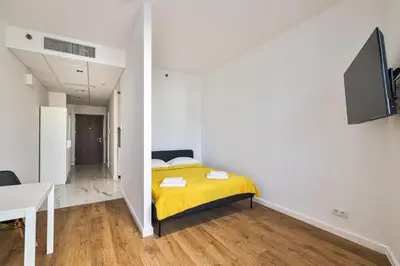 Łóżko lub łóżka w pokoju w obiekcie Kasprzaka 29 Bliska Wola Tower By Perfect Apart