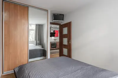 Łóżko lub łóżka w pokoju w obiekcie Vorto Apartament - Warsaw Center