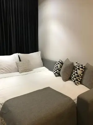 Łóżko lub łóżka w pokoju w obiekcie LUMI Warszawa Mokotów