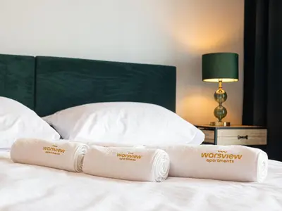 Łóżko lub łóżka w pokoju w obiekcie Warsview Apartments