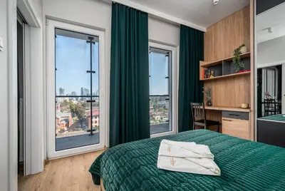 Łóżko lub łóżka w pokoju w obiekcie Warsview Apartments