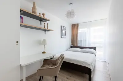 Łóżko lub łóżka w pokoju w obiekcie BOSA Warsaw Centrum Apartment Grzybowska39