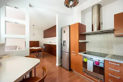 Kuchnia lub aneks kuchenny w obiekcie Pole Mokotowskie Spacious Apartment by BookingHost