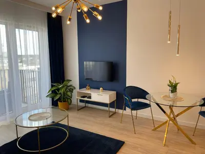 Telewizja i/lub zestaw kina domowego w obiekcie Apartament przy Marsa
