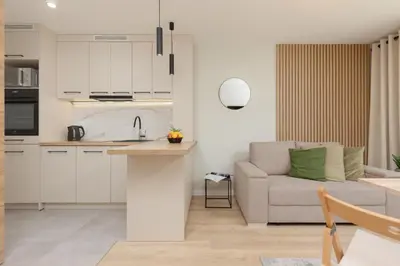 Kuchnia lub aneks kuchenny w obiekcie Aleja Jana Pawła II Studio Warsaw by Noclegi Renters