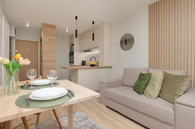 Część wypoczynkowa w obiekcie Aleja Jana Pawła II Studio Warsaw by Noclegi Renters