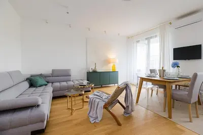 Telewizja i/lub zestaw kina domowego w obiekcie Woronicza Premium Apartments - 80
