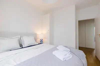Łóżko lub łóżka w pokoju w obiekcie Woronicza Premium Apartments - 80