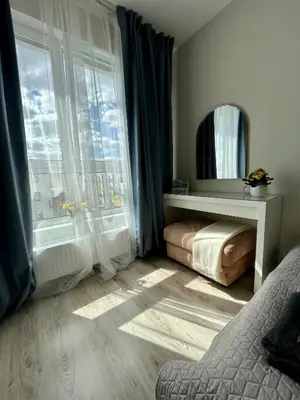 Łóżko lub łóżka w pokoju w obiekcie Życzliwa Apartment