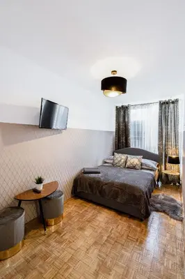 Łóżko lub łóżka w pokoju w obiekcie ClickTheFlat Norblin Factory Apart Rooms